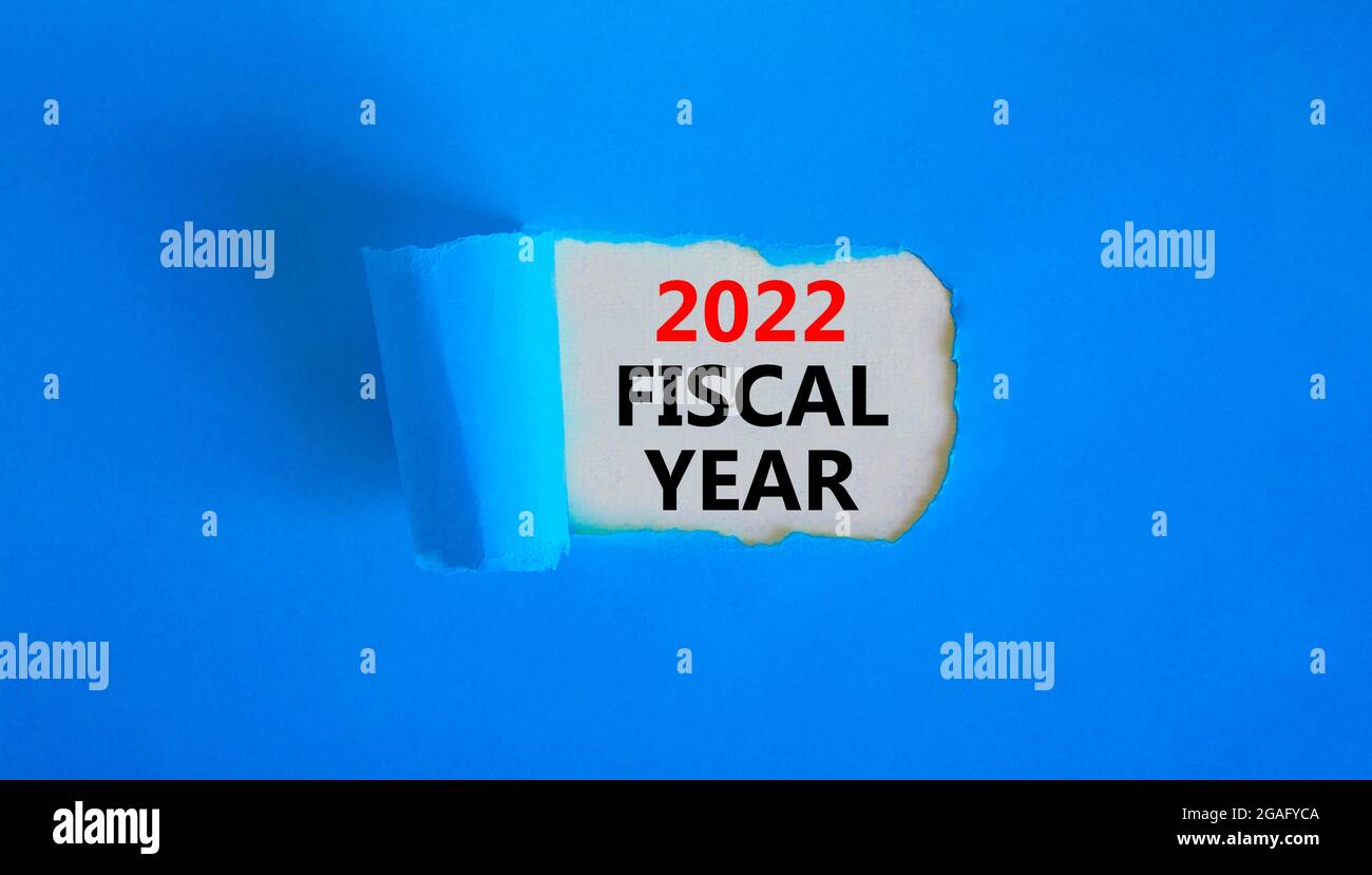 2022 Fiscal New Year Symbol Words 2022 Fiscal Year Appearing Behind Torn Blue Paper 