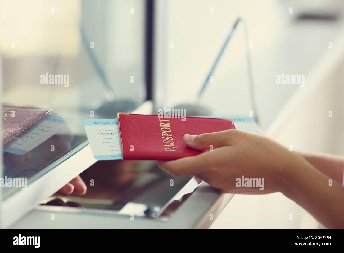 Airport Check-In Counters With Passengers Stock Photo - Alamy