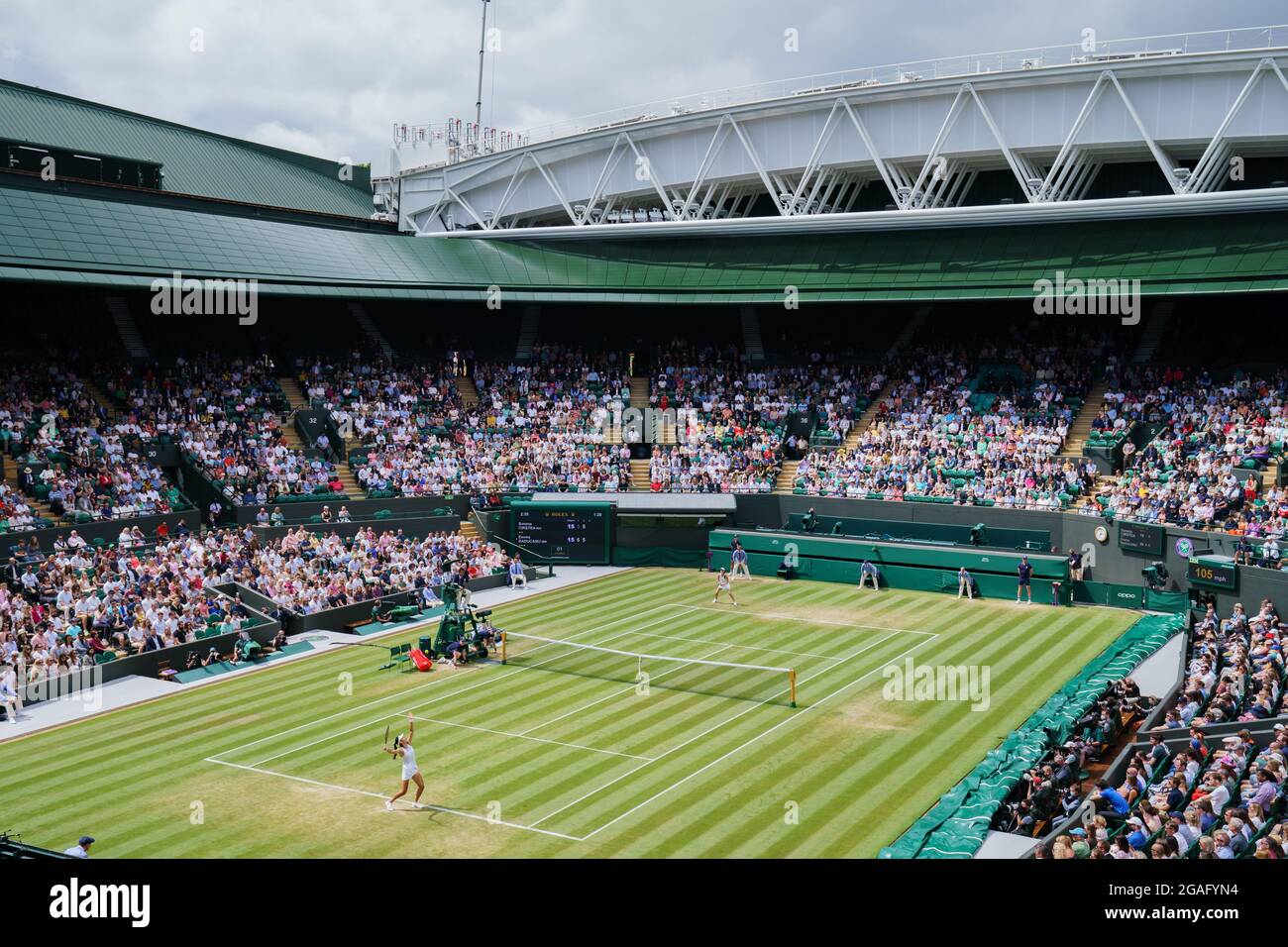 General view of No.1 Court as Emma Raducanu of GB plays Sorana Cirstea of Romania in a Ladies’ Singles match during The Wimbledon Championships 2021. Stock Photo