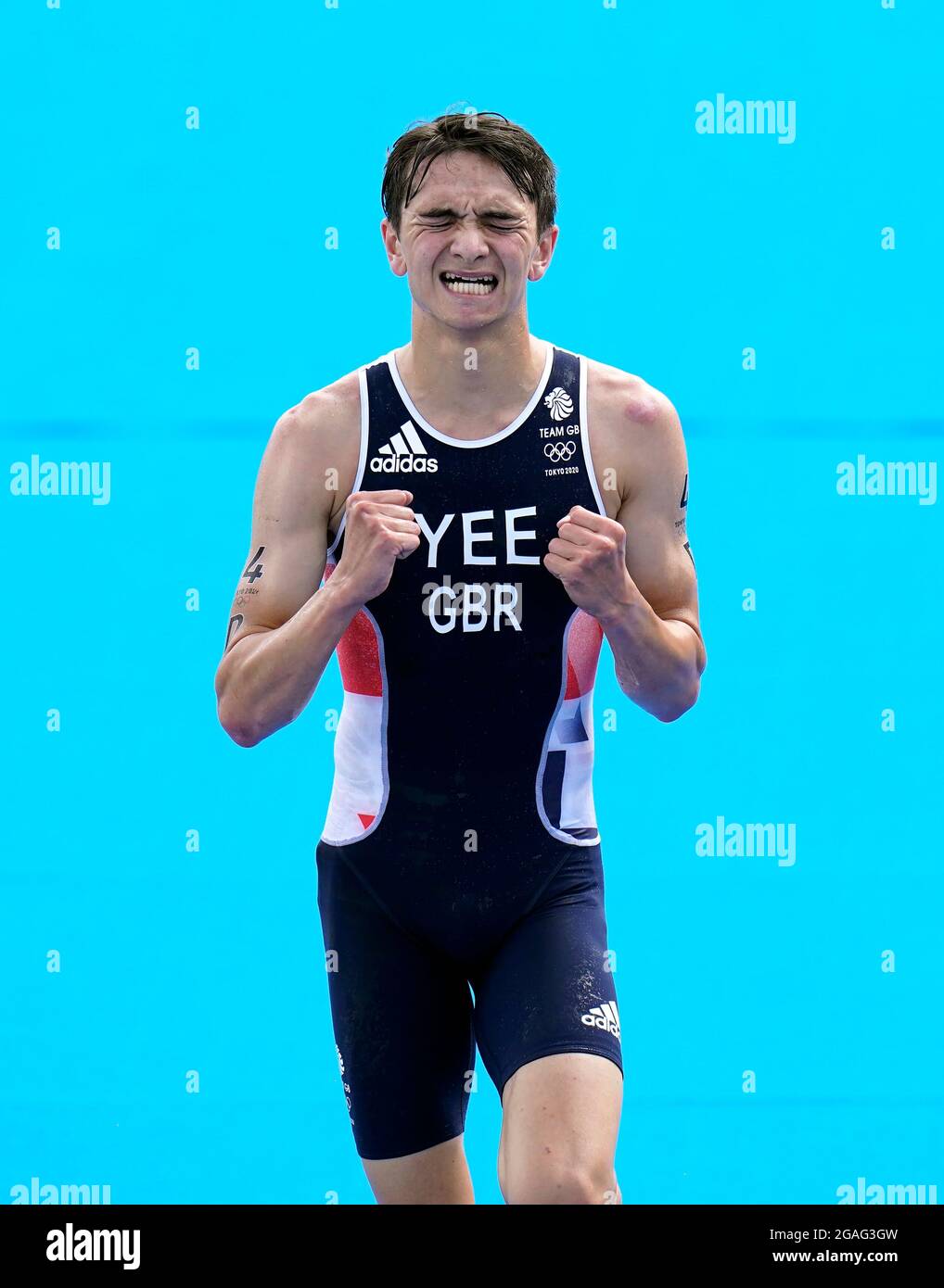 Great Britain's Alex Yee reacts as he crosses the finish line in the