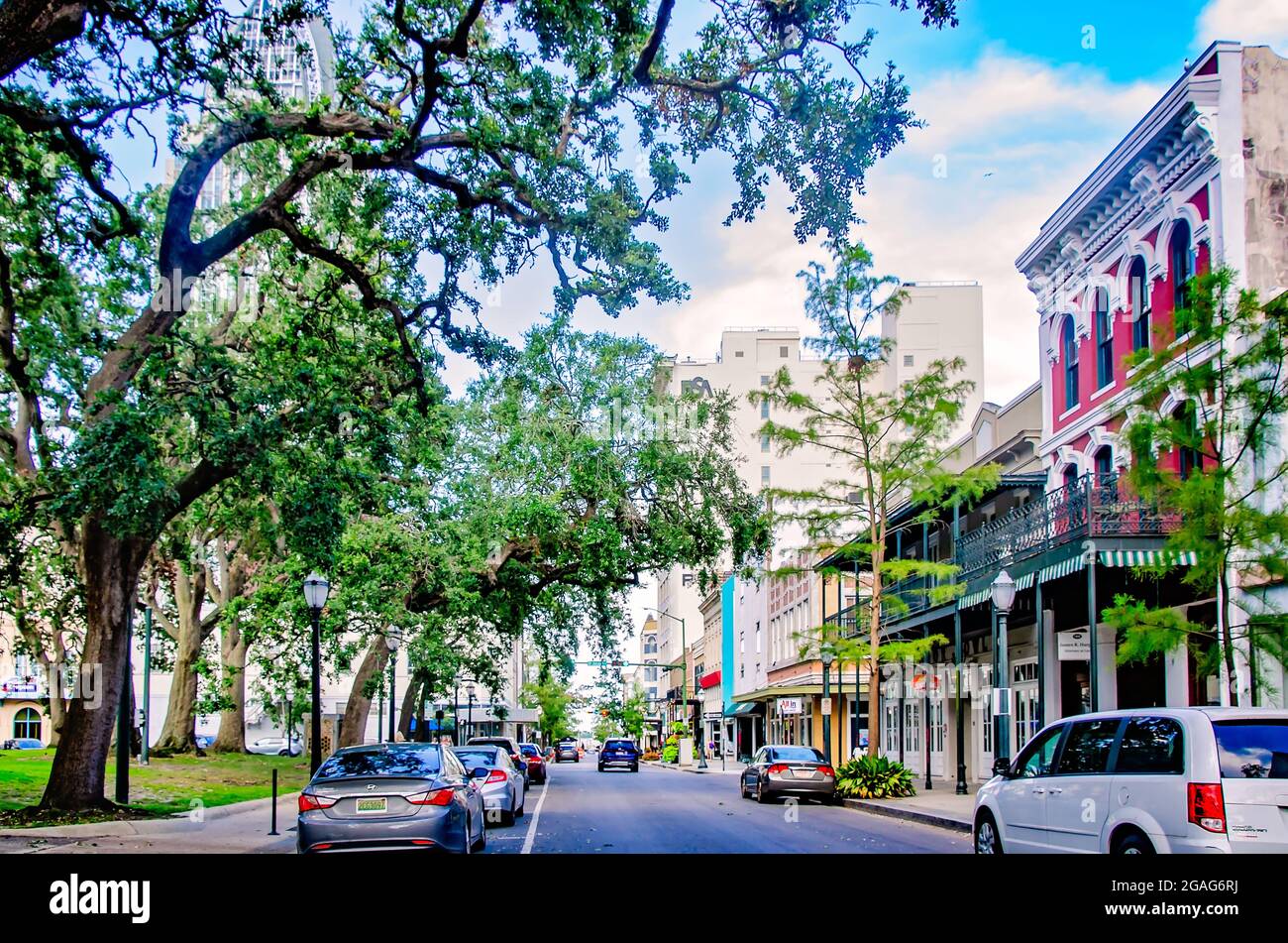 A car travels down Dauphin Street, July 28, 2021, in Mobile, Alabama