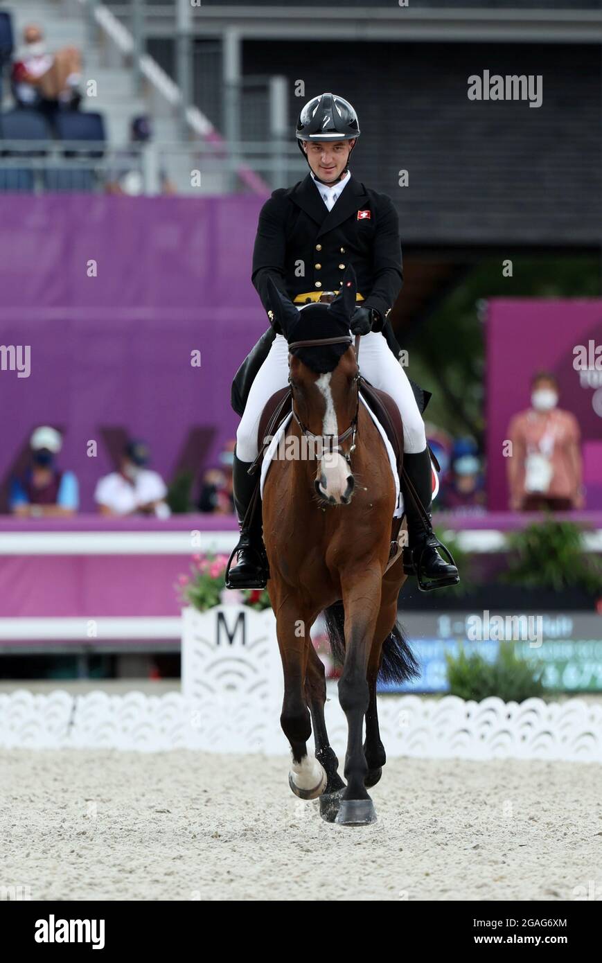 Tokyo 2020 Olympics - Equestrian - Eventing - Dressage Individual - Day 2 - Equestrian Park - Tokyo, Japan - July 31, 2021.  Robin Godel of Switzerland on his horse Jet Set compete REUTERS/Alkis Konstantinidis Stock Photo