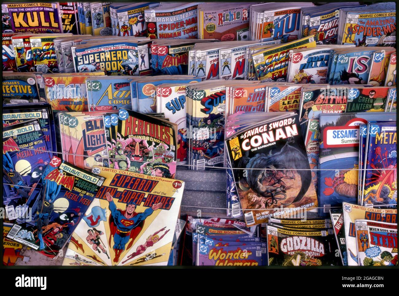 Comic books on newsstands racks at Las Palmas and Hollywood Blvd., circa 1978 Stock Photo