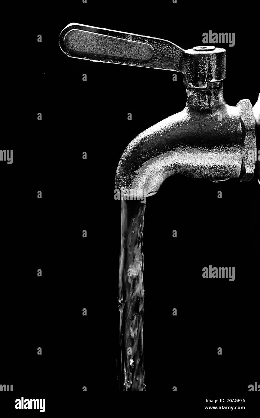 Water flows from a tap Stock Photo Alamy