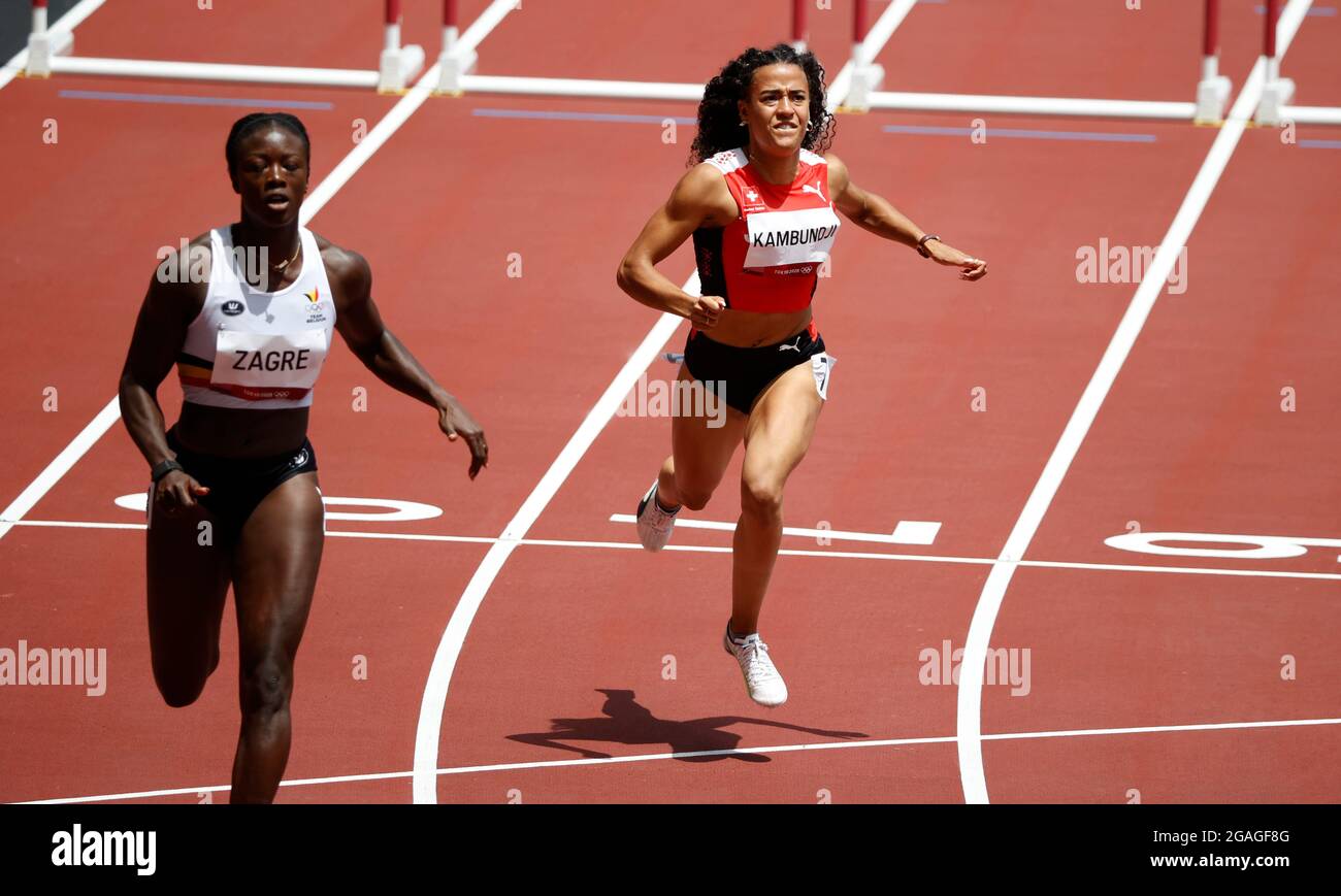 Tokyo 2020 Olympics Athletics Women S 100m Hurdles Round 1 Ols Olympic Stadium Tokyo Japan July 31 2021 Ditaji Kambundji Of Switzerland And Anne Zagre Of Belgium In Action Reuters Phil Noble Stock Photo Alamy [ 869 x 1300 Pixel ]