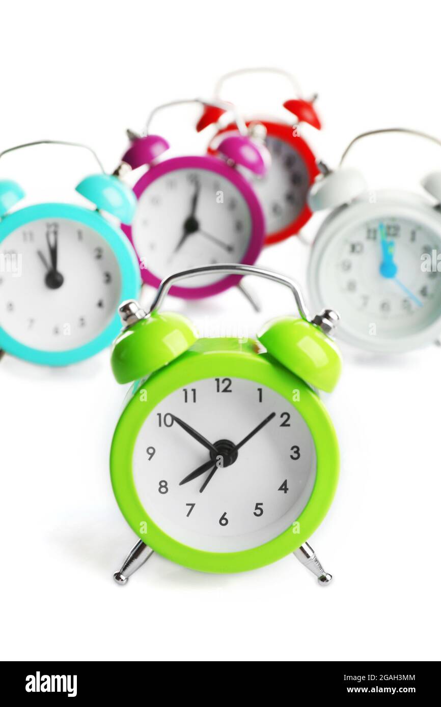 A group of alarm clocks, isolated on white Stock Photo Alamy
