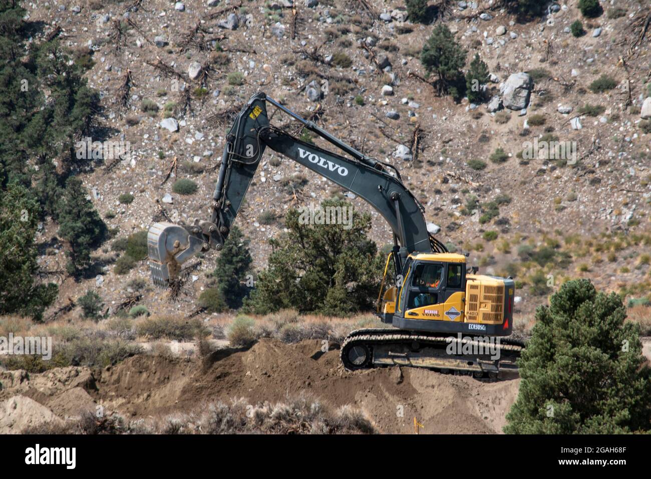 Sherwin Grade Excavators and bulldozers work on this road project on Sherwin Grade in ...
