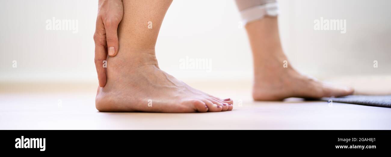 Achilles Tendinitis Pain. Heel Tendon And Ankle Injury Stock Photo