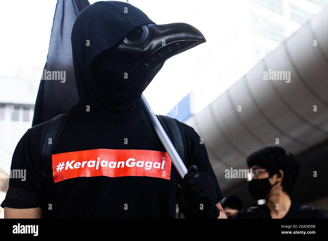 Kuala Lumpur, Malaysia. 31st July, 2021. A protester seen wearing bird ...