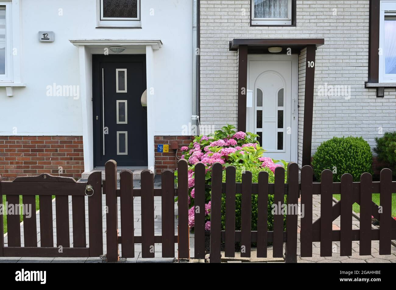 Front doors of a semi-detached house from the late 1950s Stock Photo