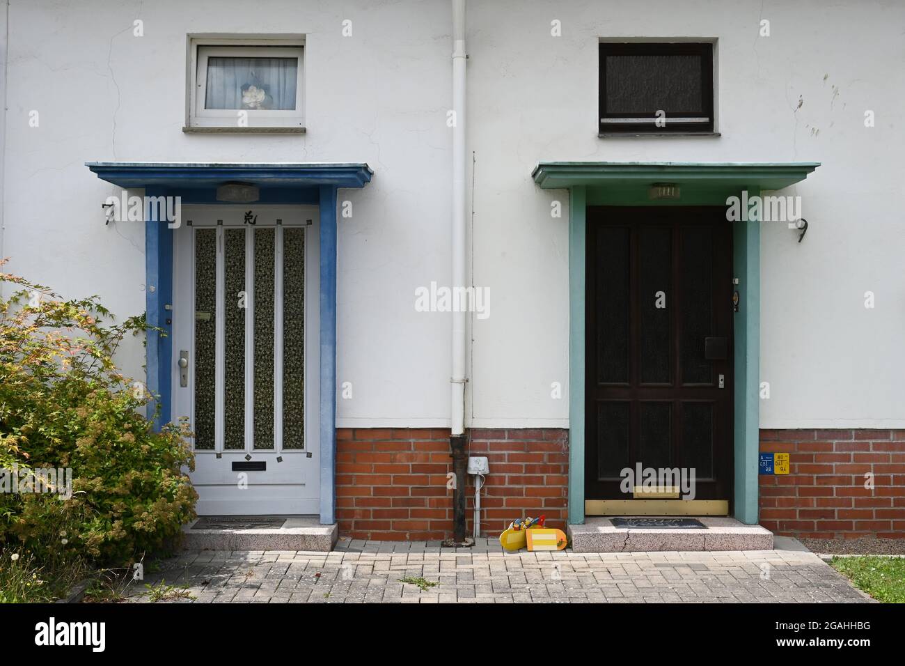 Front doors of a semi-detached house from the late 1950s Stock Photo