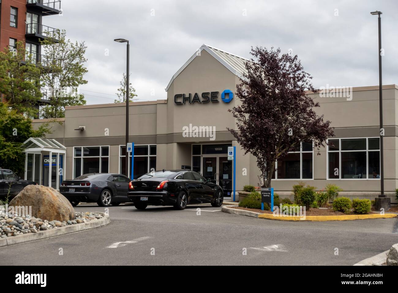 Kirkland, WA USA - circa July 2021: Street view of the drive thru banking area of a Chase bank. Stock Photo