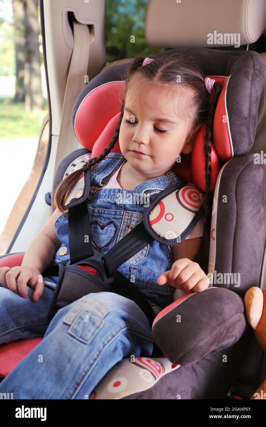 Little cute girl sleeping in the car Stock Photo Alamy