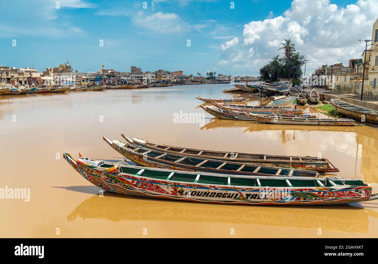 Fisher Boats in Saint Louis city, Ndar district, the ancient colonial city located in northern Senegal, West Africa. Stock Photo