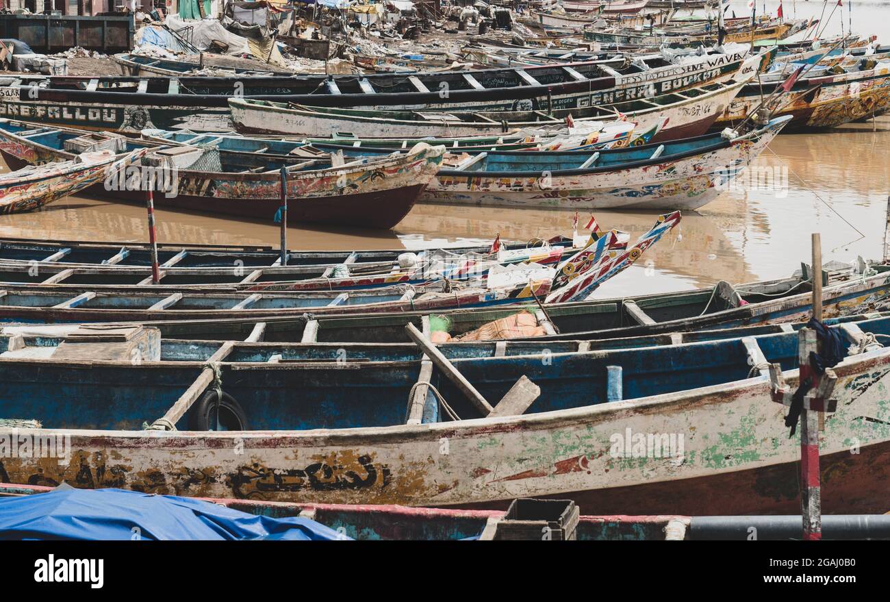 Fisher Boats in Saint Louis city, Ndar district, the ancient colonial city located in northern Senegal, West Africa. Stock Photo