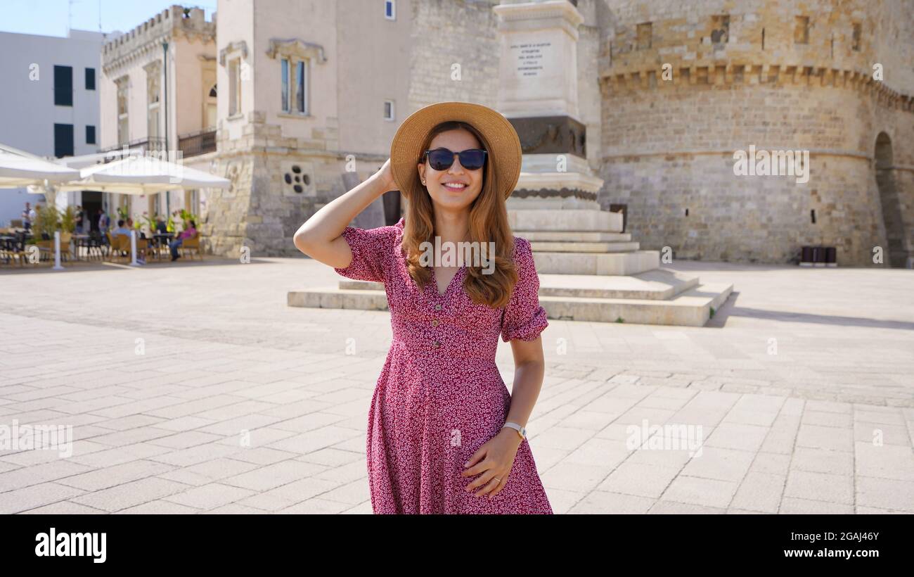 Panoramic view of fashionable cheerful woman in Otranto, Salento, Italy Stock Photo