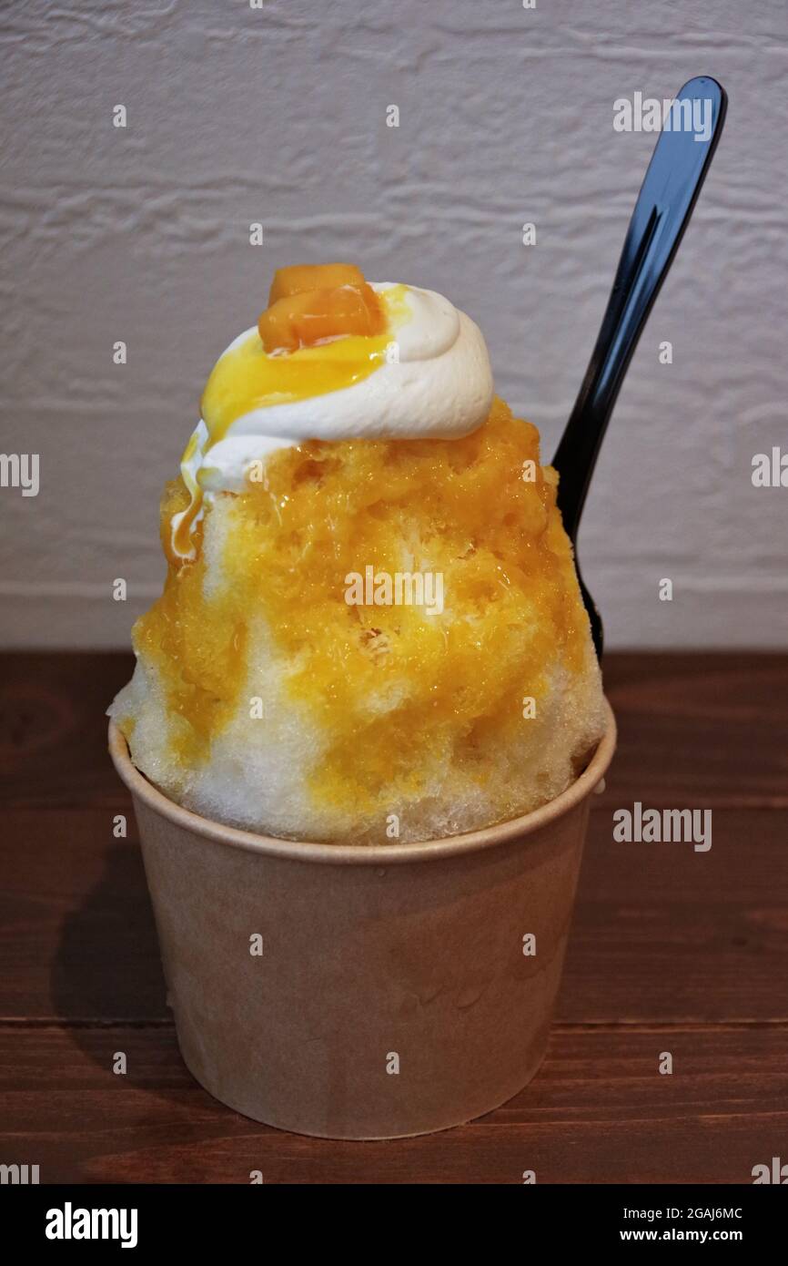 Nagano, Japan, 2021-31-07, Cup of Kakigori, a traditional Japanese shaved ice served with syrups. Stock Photo