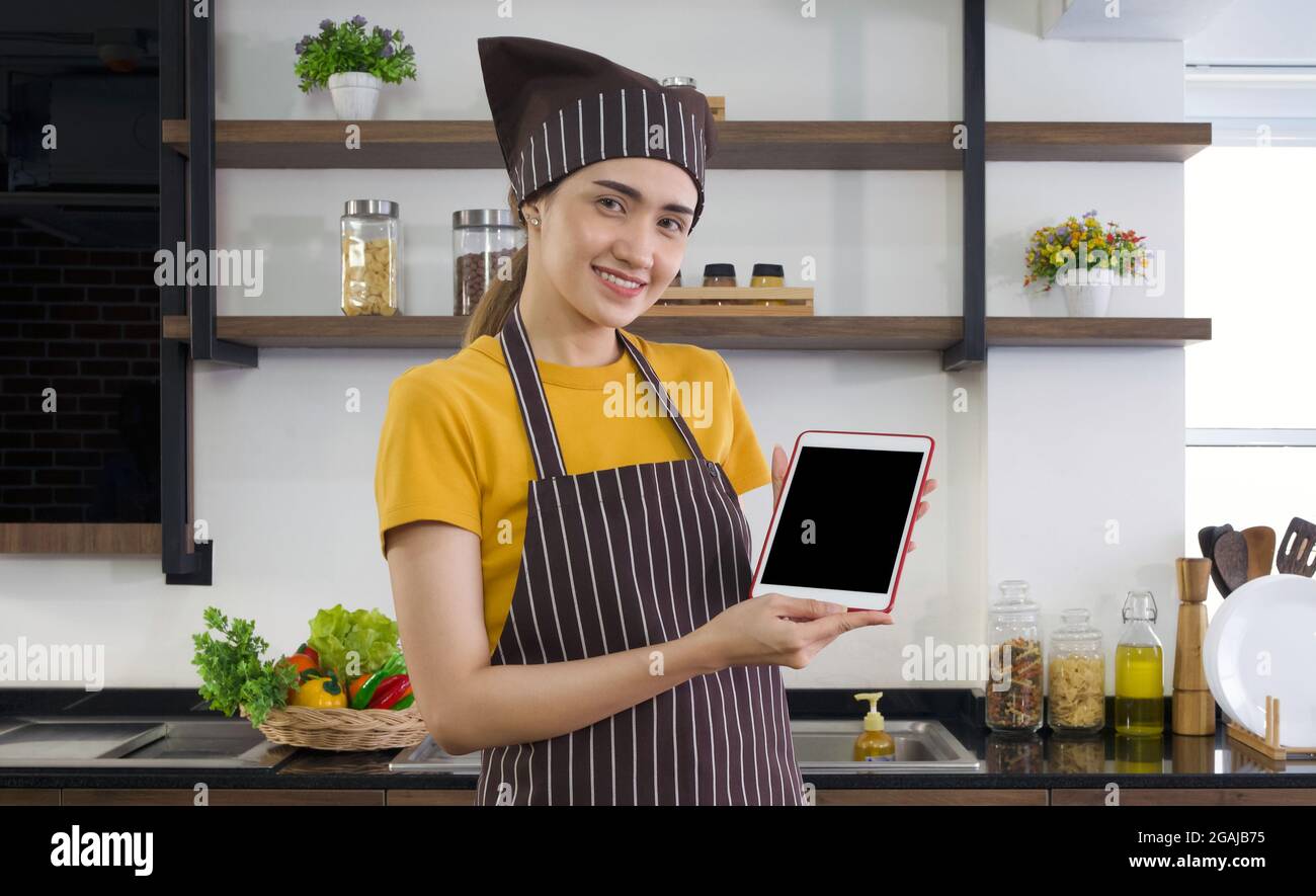 The housewife dressed in an apron and a 