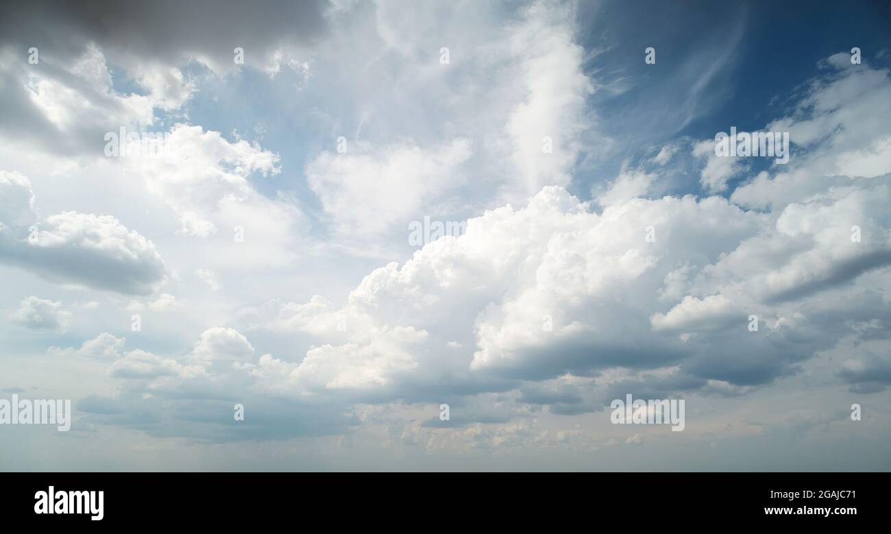 Thunderstorm weather background. Bright big fluffy clouds Stock Photo