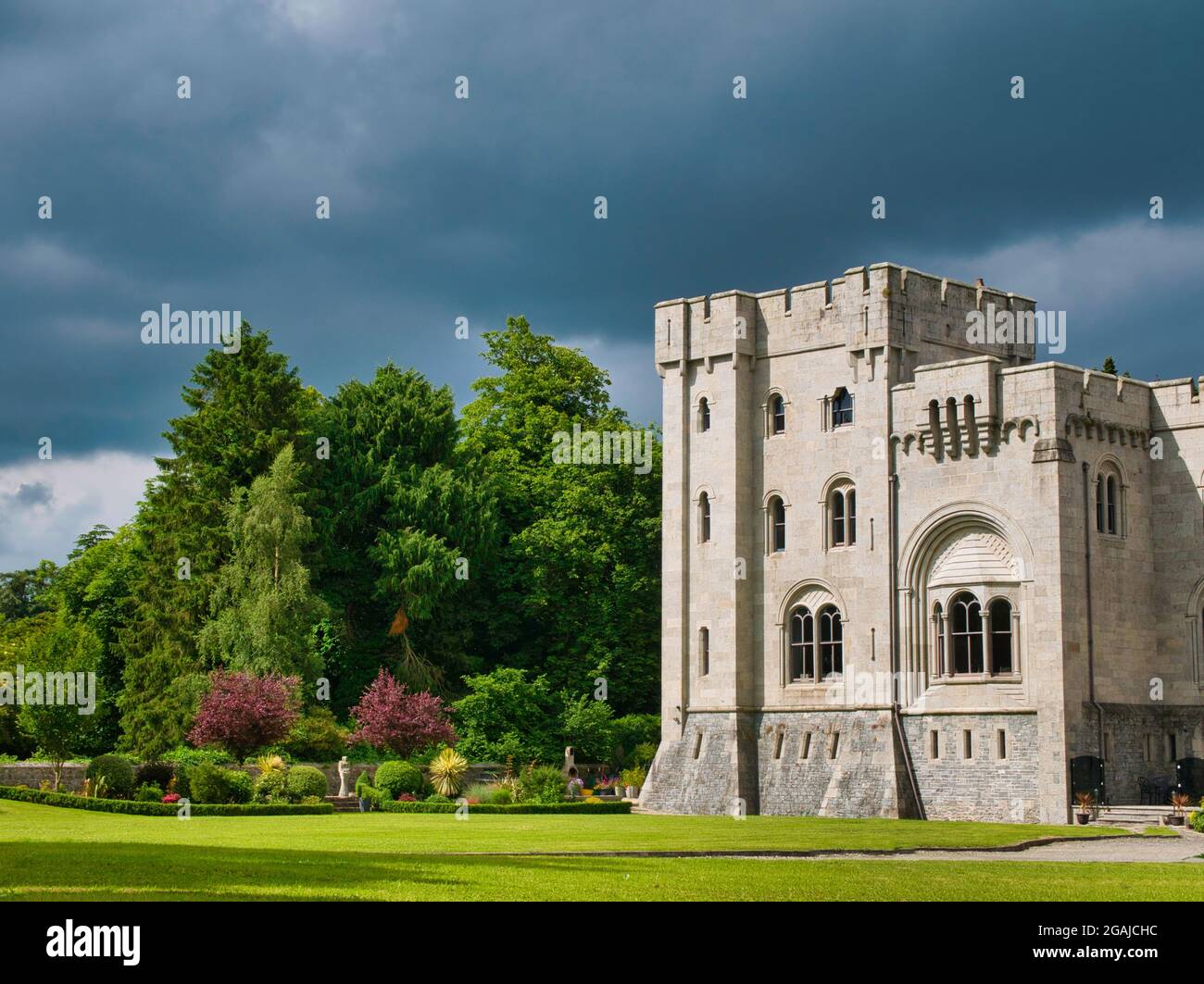 The 19th-century country house and gardens of Gosford Castle, situated in Gosford Forest Park near Markethill, County Armagh, Northern Ireland. Stock Photo