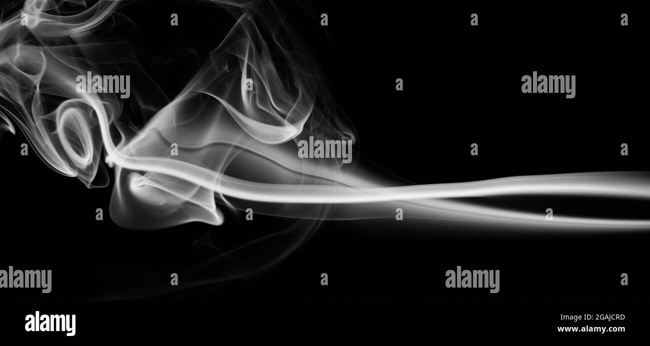 Stripe of white smoke isolated on black background Stock Photo