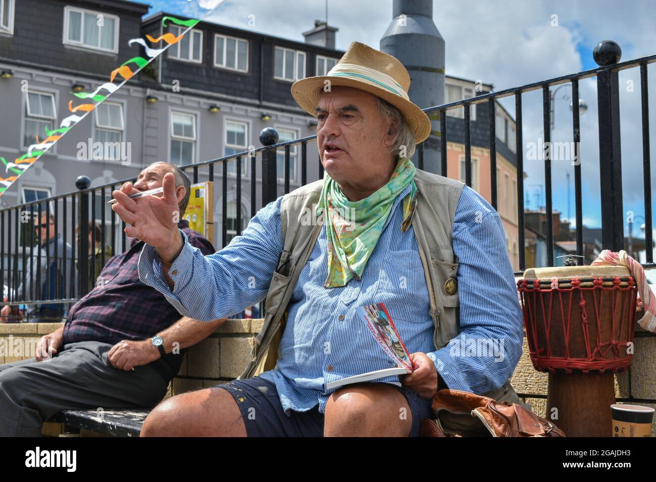 Bantry, West Cork, Ireland. 30th July 2021. Ian Bailey’s appeal against his conviction for drug driving and the possession of drugs has been adjourned until October. Pictured below Ian Bailey at Bantry market selling books and signing them. Credit: Karlis Dzjamko/Alamy Live News Stock Photo