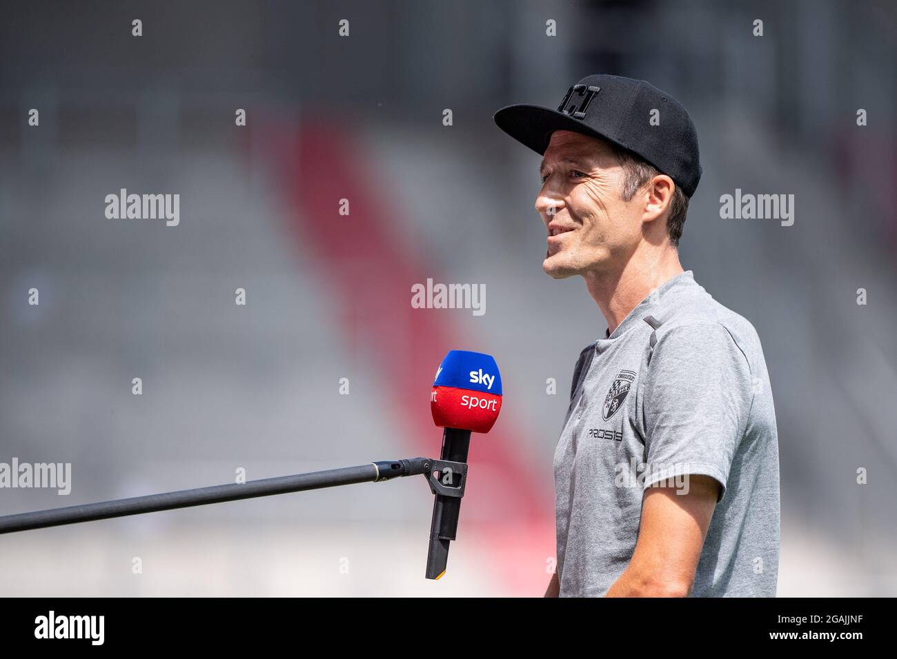 Ingolstadt, Germany. 31st July, 2021. Football: 2nd Bundesliga, FC Ingolstadt 04 - 1. FC Heidenheim, Matchday 2 at Audi Sportpark. Coach Roberto Pätzold of Ingolstadt gives an interview before the start of the match. Credit: Matthias Balk/dpa - IMPORTANT NOTE: In accordance with the regulations of the DFL Deutsche Fußball Liga and/or the DFB Deutscher Fußball-Bund, it is prohibited to use or have used photographs taken in the stadium and/or of the match in the form of sequence pictures and/or video-like photo series./dpa/Alamy Live News Stock Photo