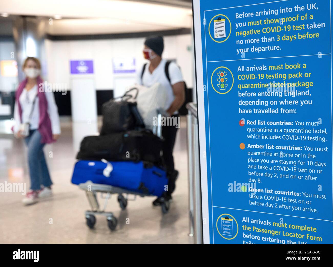 London, UK. 31st July, 2021. Passengers arriving at Terminal 2. Adults who have been fully vaccinated through the NHS now don't need to self-isolate when they return from most amber list countries. Children also don't have to quarantine. Credit: Mark Thomas/Alamy Live News Stock Photo