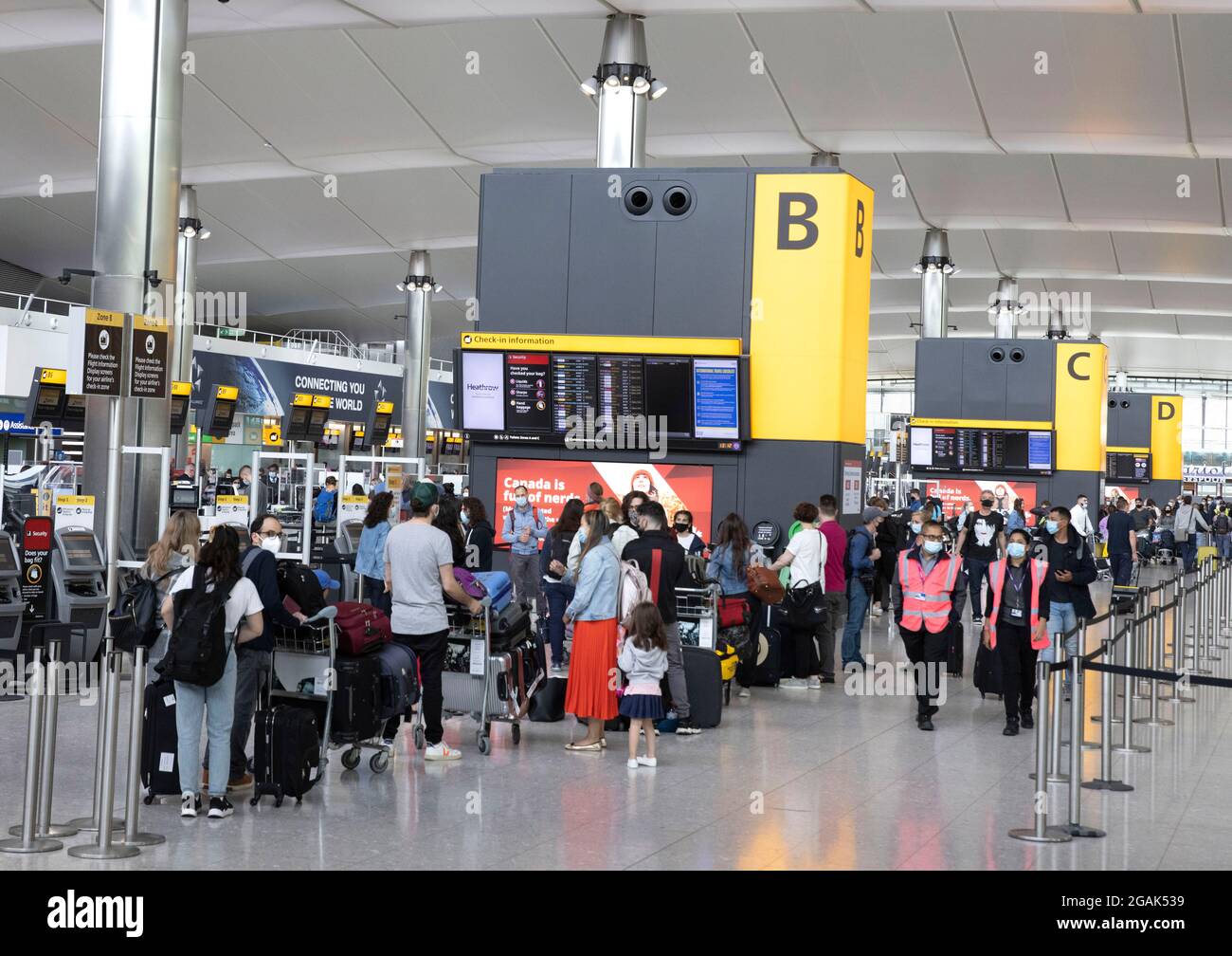 London, UK. 31st July, 2021. Passengers Departing from Terminal 2. Adults who have been fully vaccinated through the NHS now don't need to self-isolate when they return from most amber list countries. Children also don't have to quarantine. Credit: Mark Thomas/Alamy Live News Stock Photo
