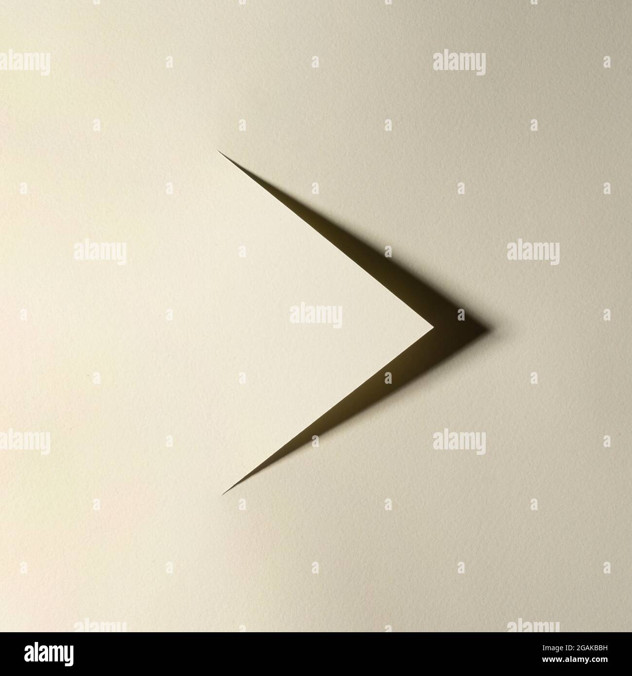 the shadow of an arrow indicating the direction made with a cut card Stock Photo Alamy