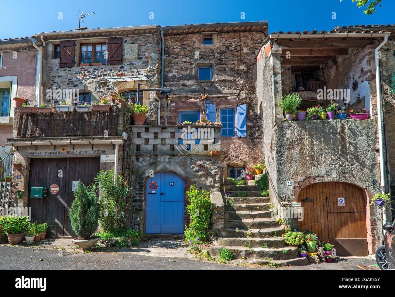 Rue des Fontaines in village of Salasc, commune in Herault department, Occitanie region, France Stock Photo