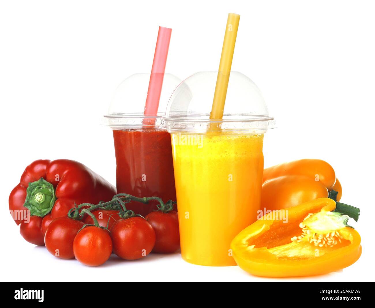 Fresh vegetable juices in plastic cups isolated on white Stock Photo