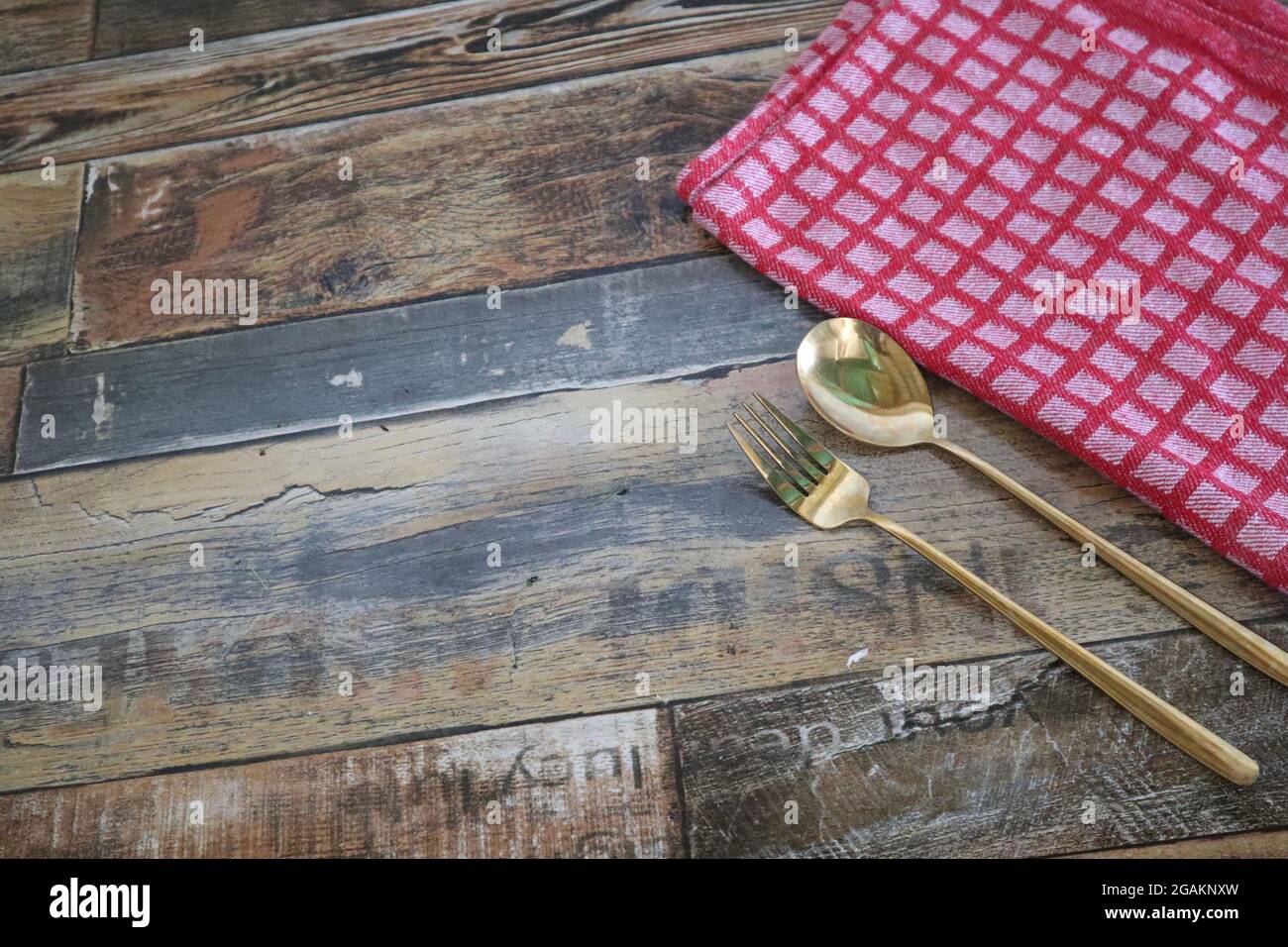 Food background with golden spoon and wooden table Stock Photo - Alamy