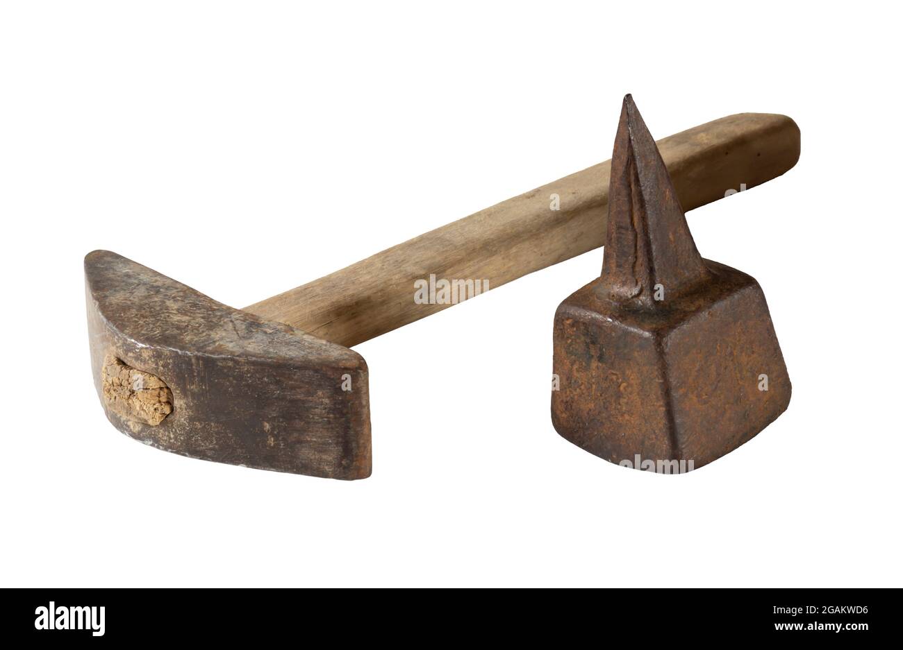 An old metal anvil for punching a hand scythe. Rusty object isolated on a white background Stock Photo