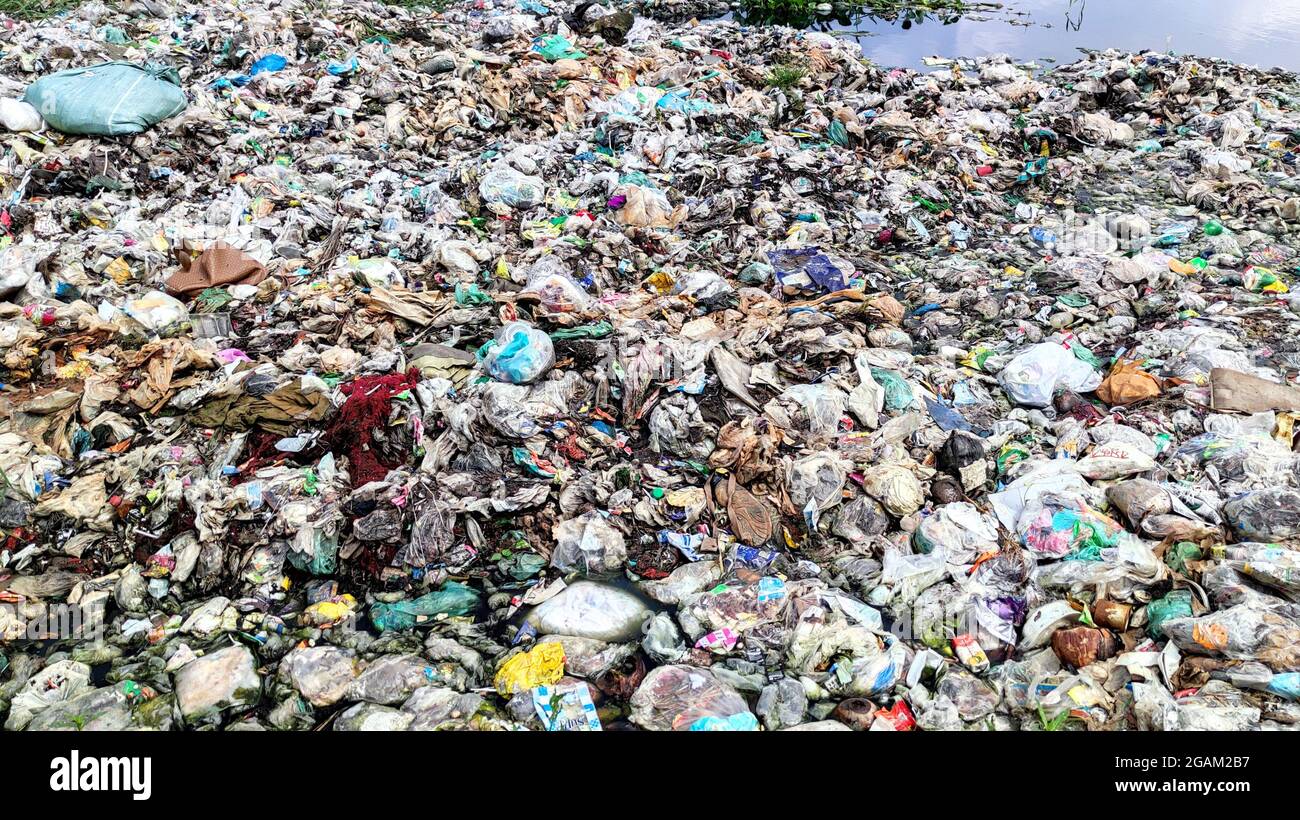 Environmental pollution by dumping different types of garbage in water