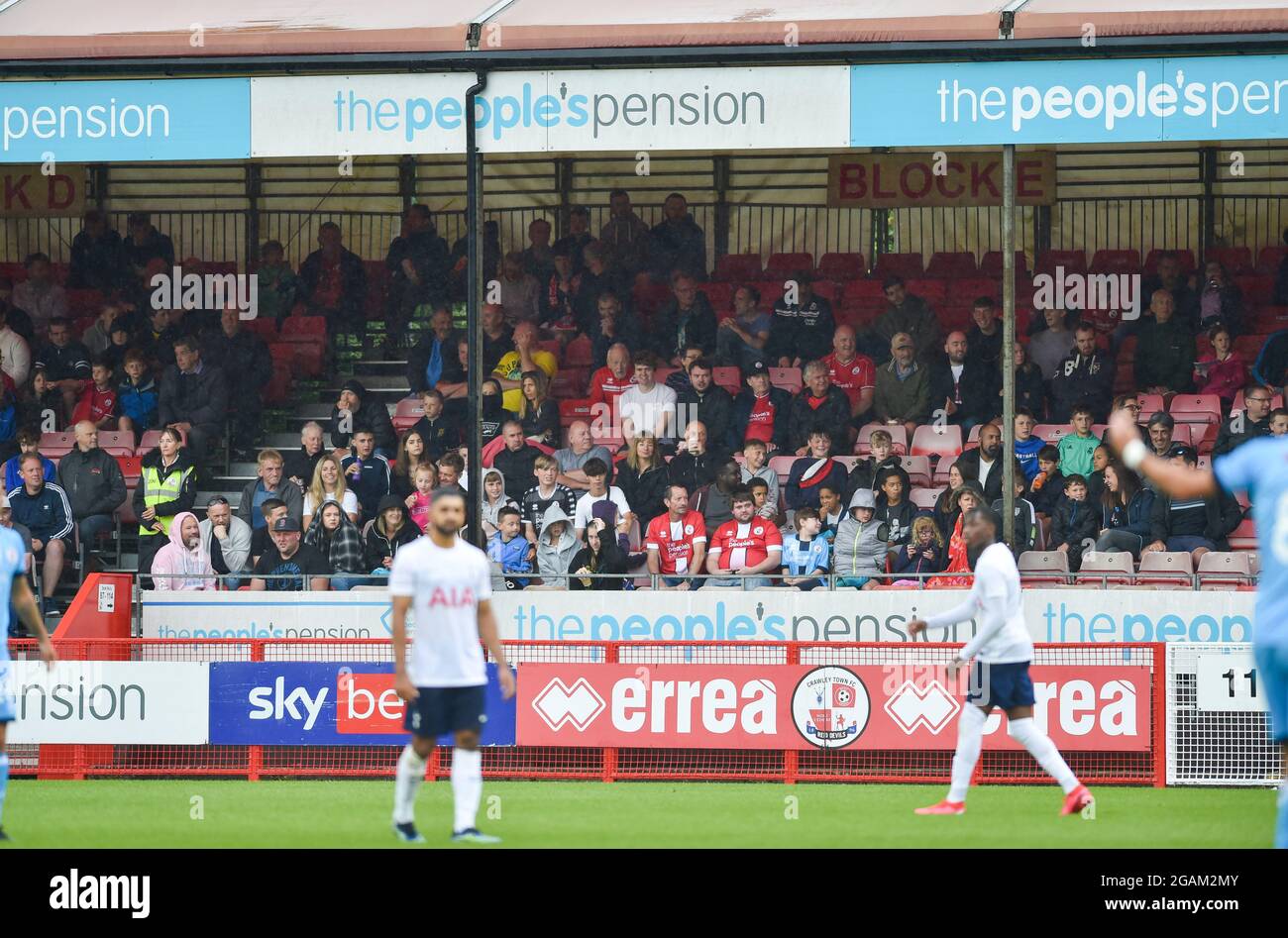 Crawley UK 31st July 2021 - Fans back in watching during the Pre Season Friendly football match between Crawley Town and a Tottenham Hotspur Under 23s team at the Peoples Pension Stadium in Crawley : Credit Simon Dack / Alamy Live News Stock Photo