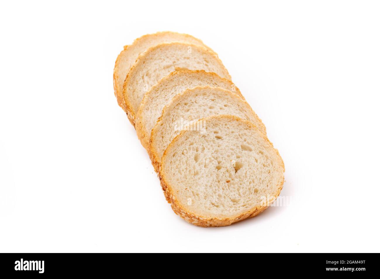 Slices of white bread or a loaf with sesame seeds isolated on a white ...