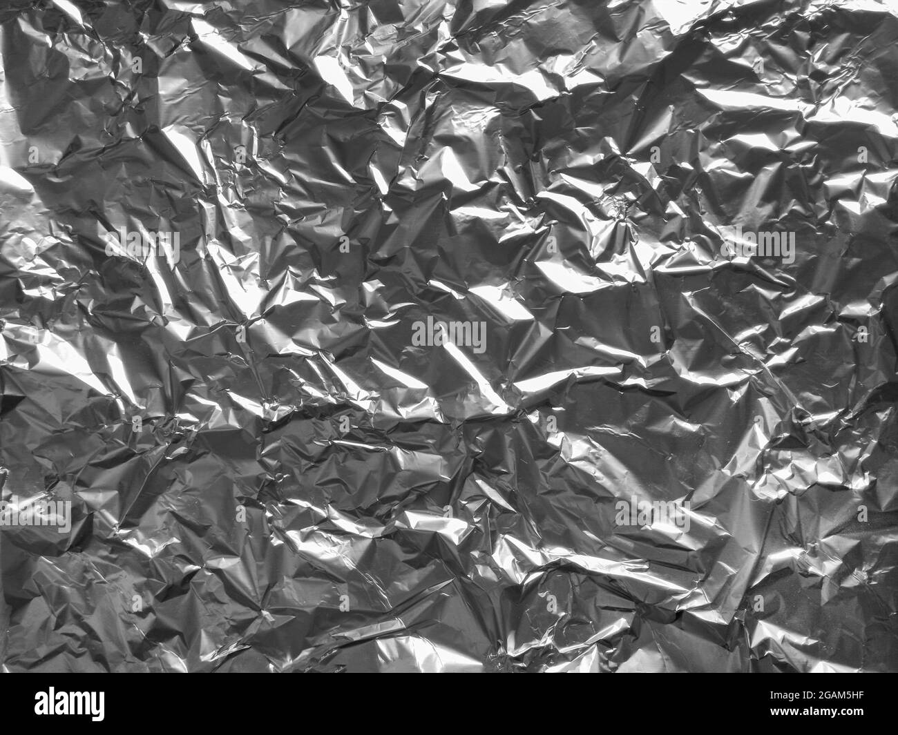 Silver metallic foil Black and White Stock Photos & Images - Alamy