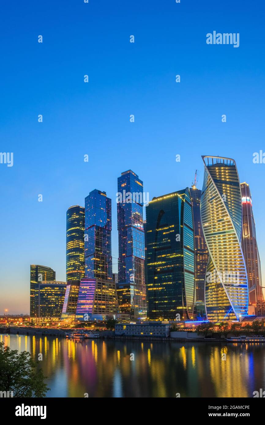 Buildings Of Moscow City Complex Of Skyscrapers At Evening in night illumination, Moscow, Russia Stock Photo