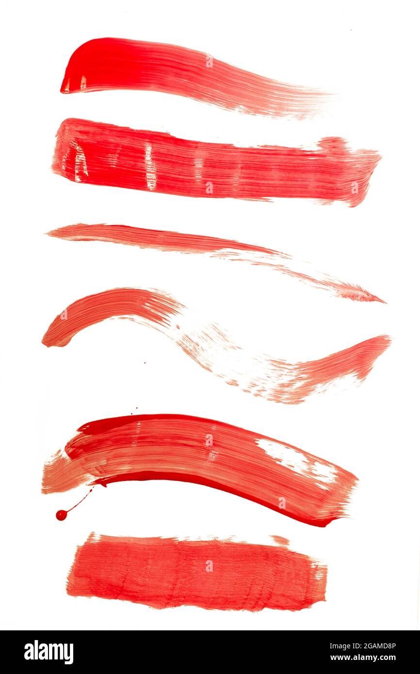 red brush strokes isolated on a white background Stock Photo - Alamy