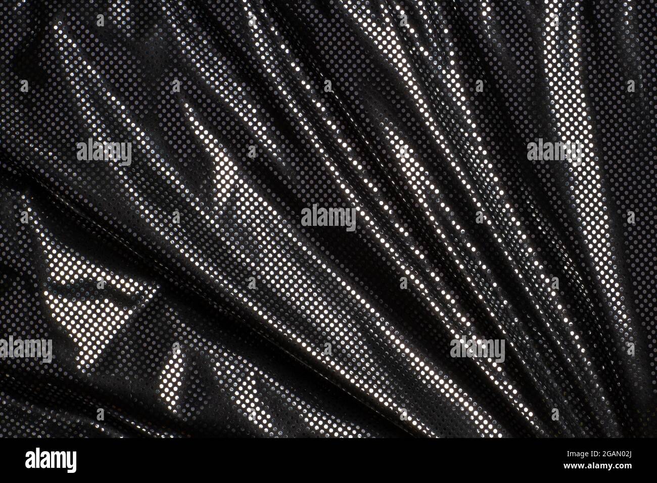 Gray black metalic silver polka dot fabric texture background Stock Photo