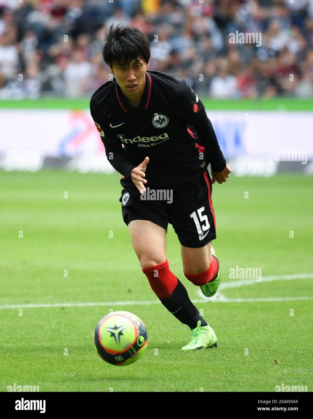 31 July 2021, Hessen, Frankfurt/Main: Football, test matches: Eintracht Frankfurt against AS Saint Étienne at Deutsche Bank Park. Frankfurt's Daichi Kamada in action. Photo: Arne Dedert/dpa Stock Photo
