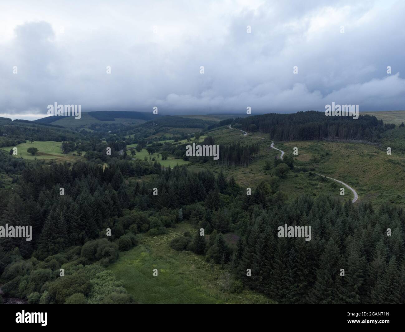 Llwyn Onn reservoir, Merthyr Tydfil, South Wales. 31 July 2021. UK weather: Dark skies over the reservoir this evening. Credit: Andrew Bartlett/Alamy Live News. Stock Photo