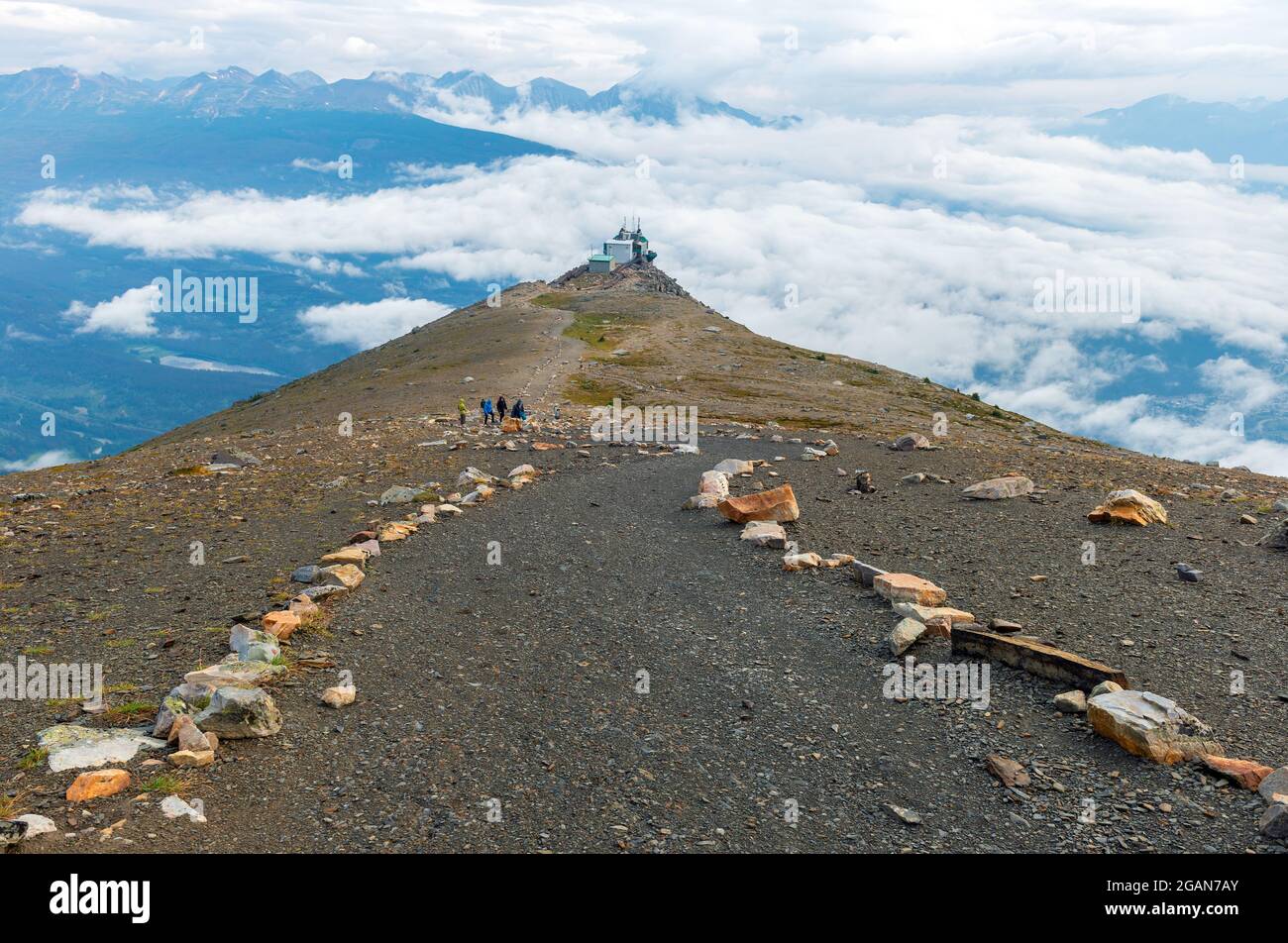 Unrecognizable people tourists doing the Whistler mountain hike, British Columbia, Canada. Stock Photo