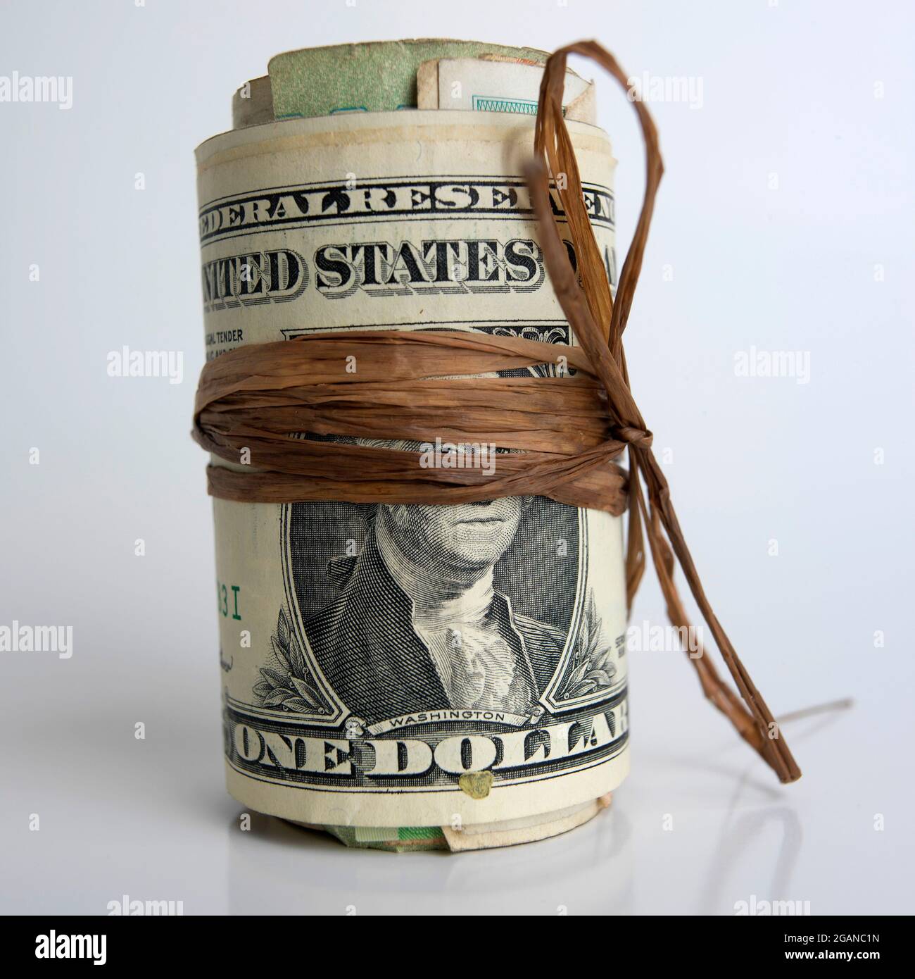 Roll of dollar banknotes Stock Photo