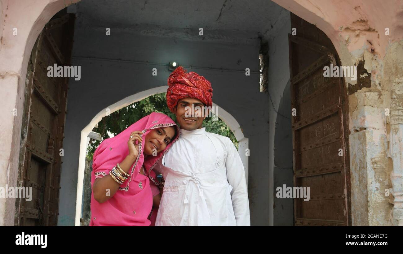 Indian couple in Indian traditional clothing posing Stock Photo - Alamy