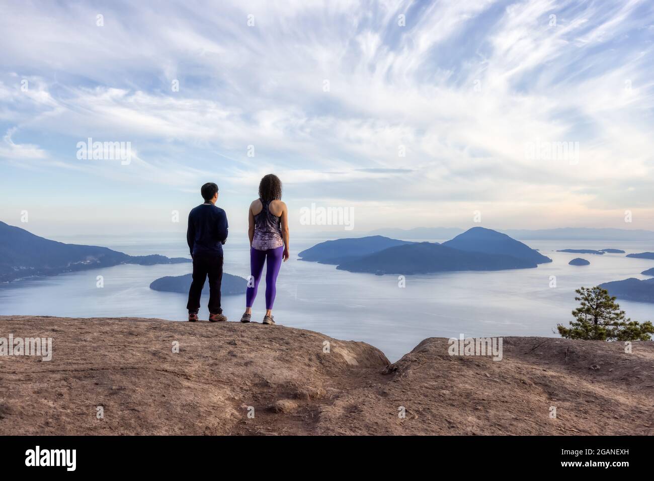 Friends hiking on top of Canadian Mountain Landscape Stock Photo - Alamy