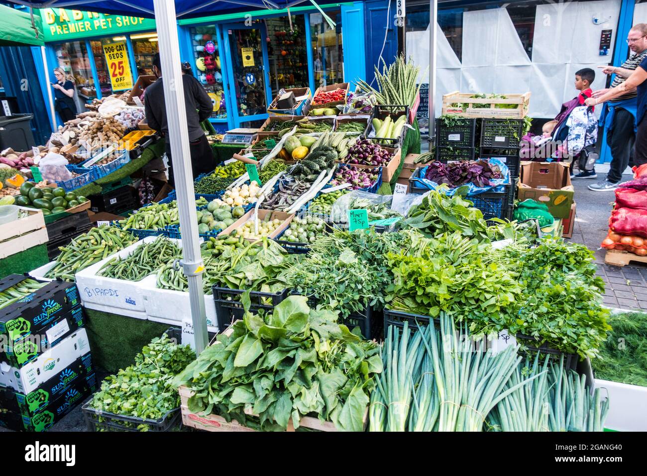 Croydon surrey street market vendors selling fruits and vegetables in open air market Stock Photo