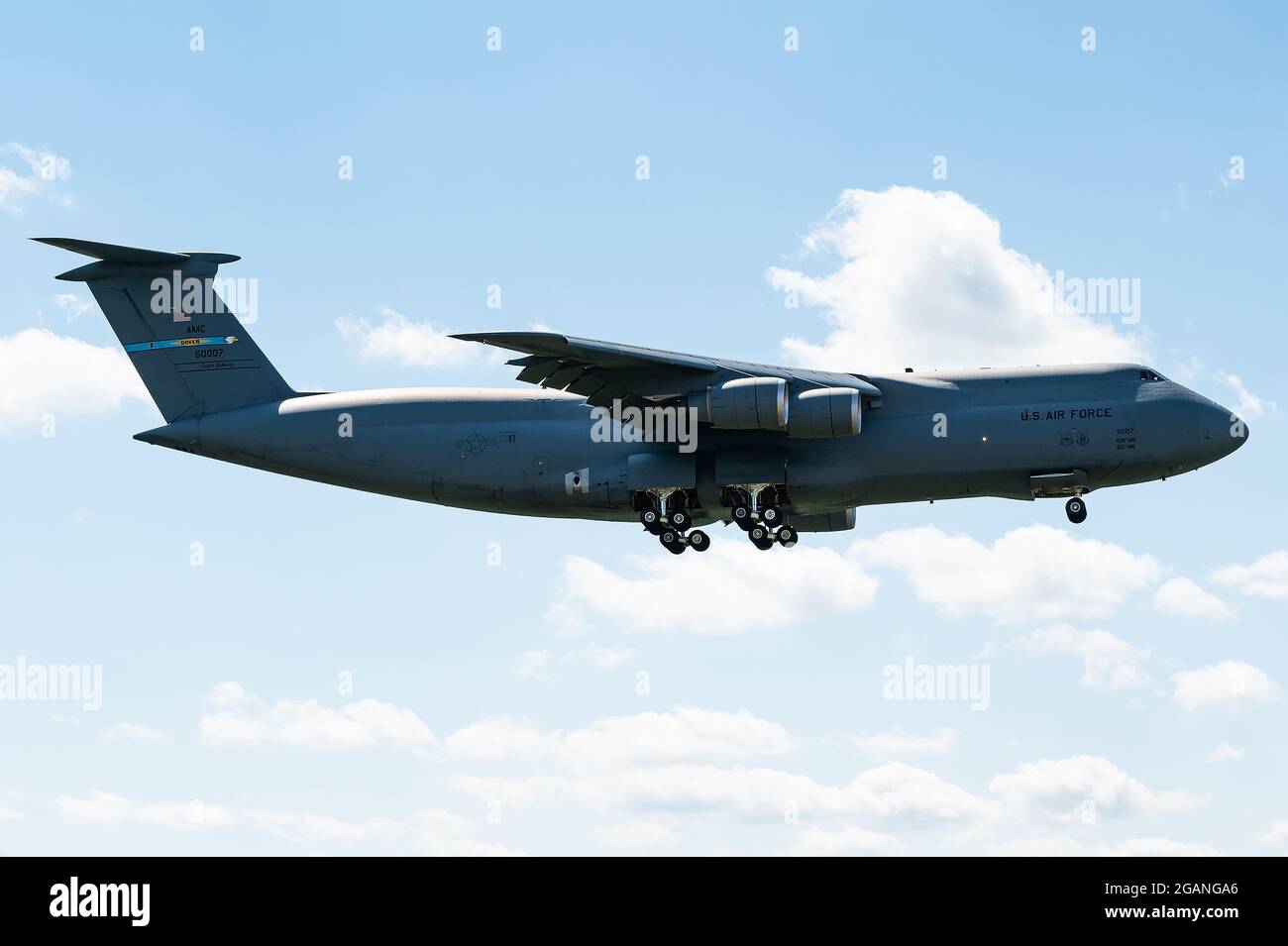 The mighty Lockheed C-5 Galaxy of the USAF is ready to land at Ramstein Air Base in Germany. Stock Photo