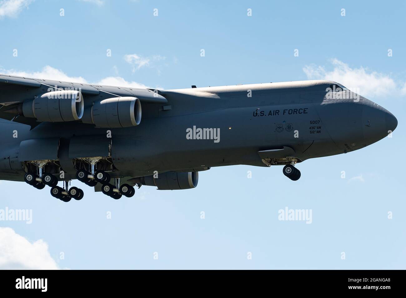 The mighty Lockheed C-5 Galaxy of the USAF is ready to land at Ramstein Air Base in Germany. Stock Photo